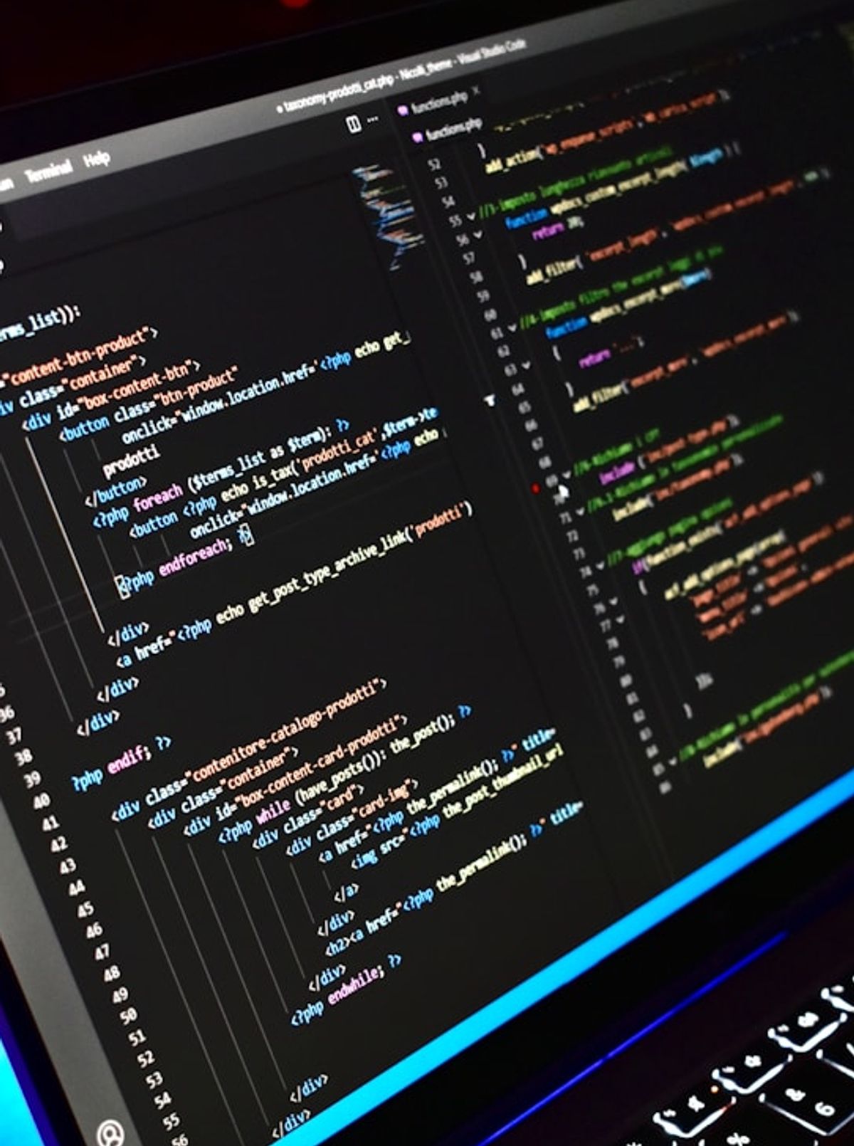 Developer reviewing website code during a custom build