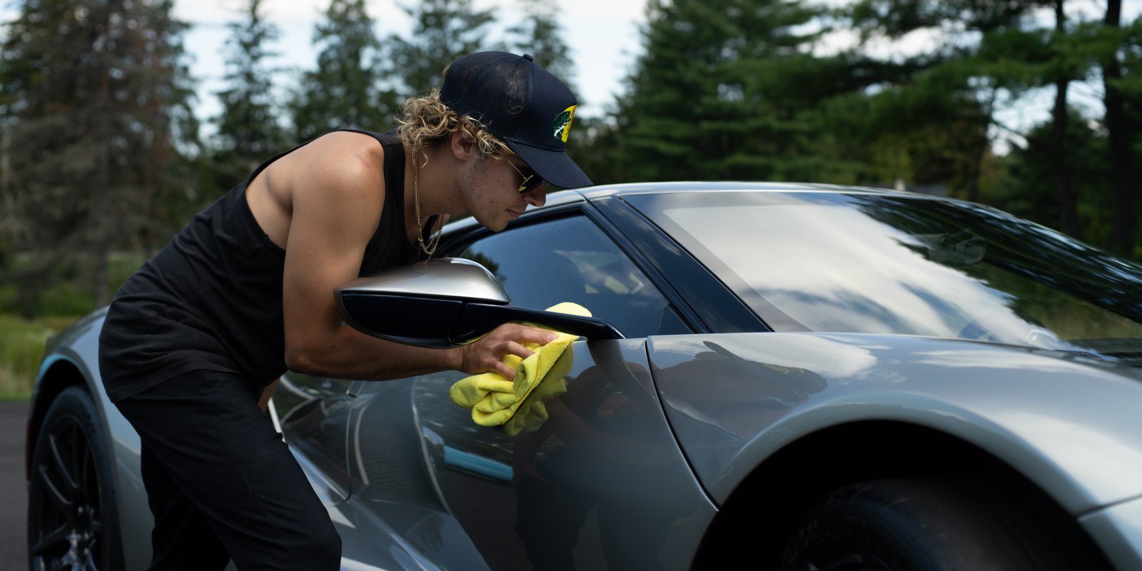 Construction team with drill working on a residential roof for local trade services