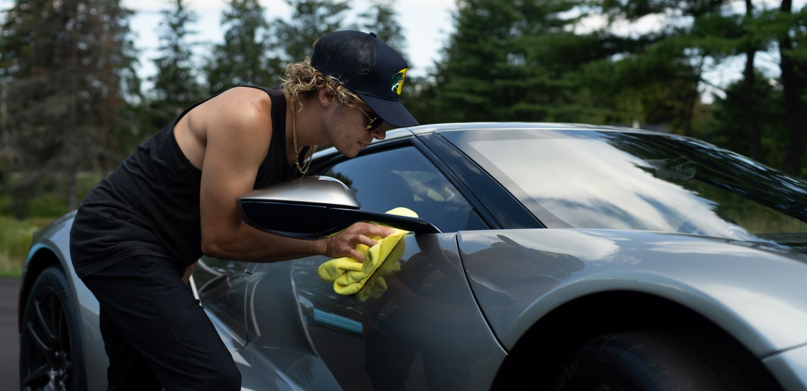 Construction team with drill working on a residential roof for local trade services